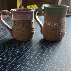 2 Mudworks Ceramic Mugs - Purple and Green “Simplify”